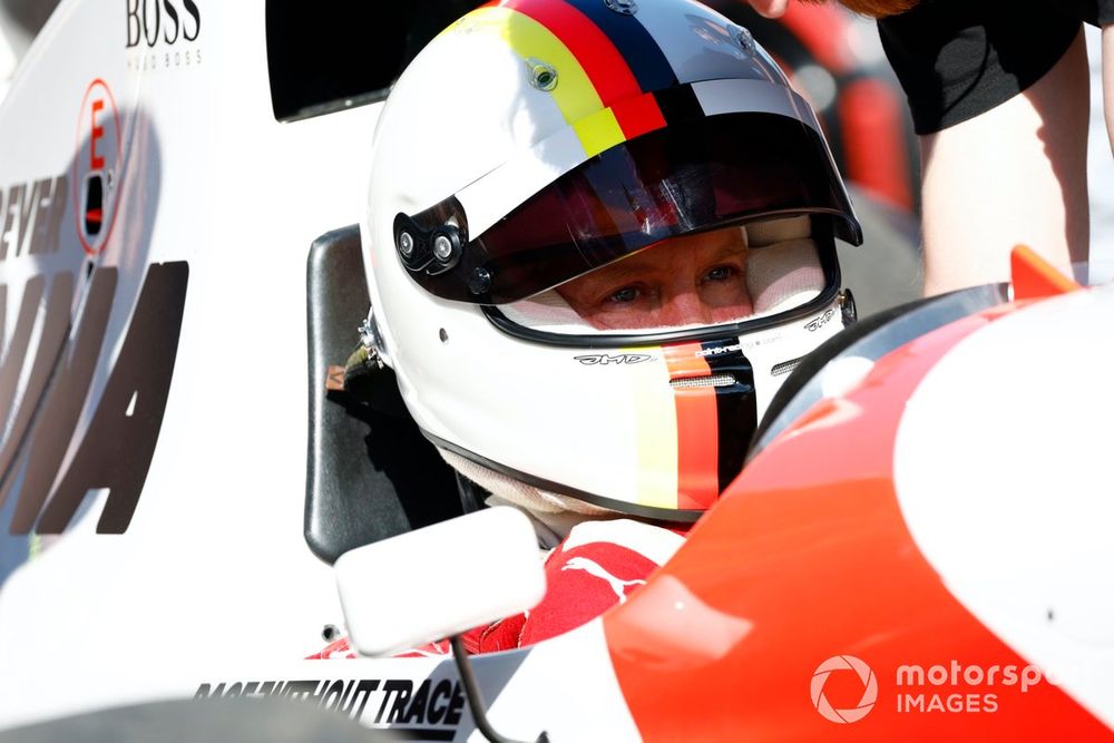 Sebastian Vettel prepares to drive Ayrton Senna's McLaren MP4/8