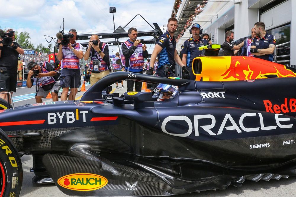Sergio Perez, Red Bull Racing RB20, in the pit lane 