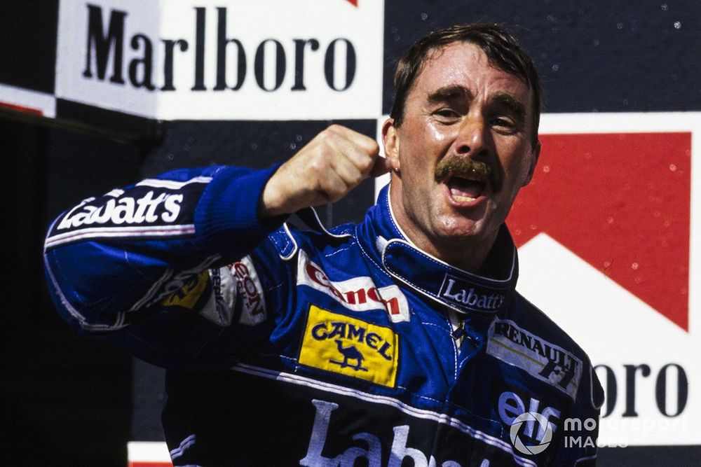 Podium: second place Nigel Mansell, Williams Renault, celebrates his world championship victory