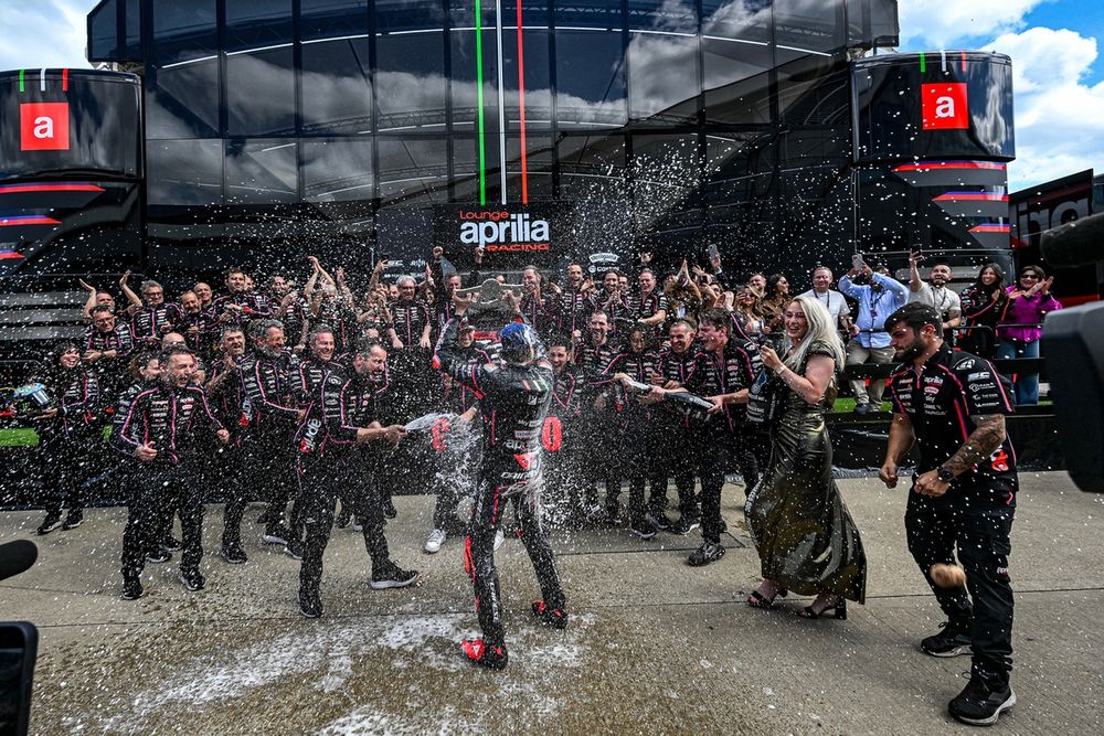 Bezzecchi laps up the celebrations with his Aprilia team