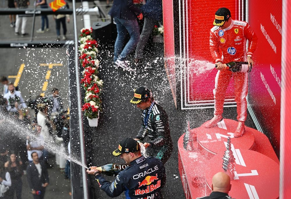 Charles Leclerc, Ferrari, sul podio di Spa dopo il secondo posto con Antonelli e Verstappen