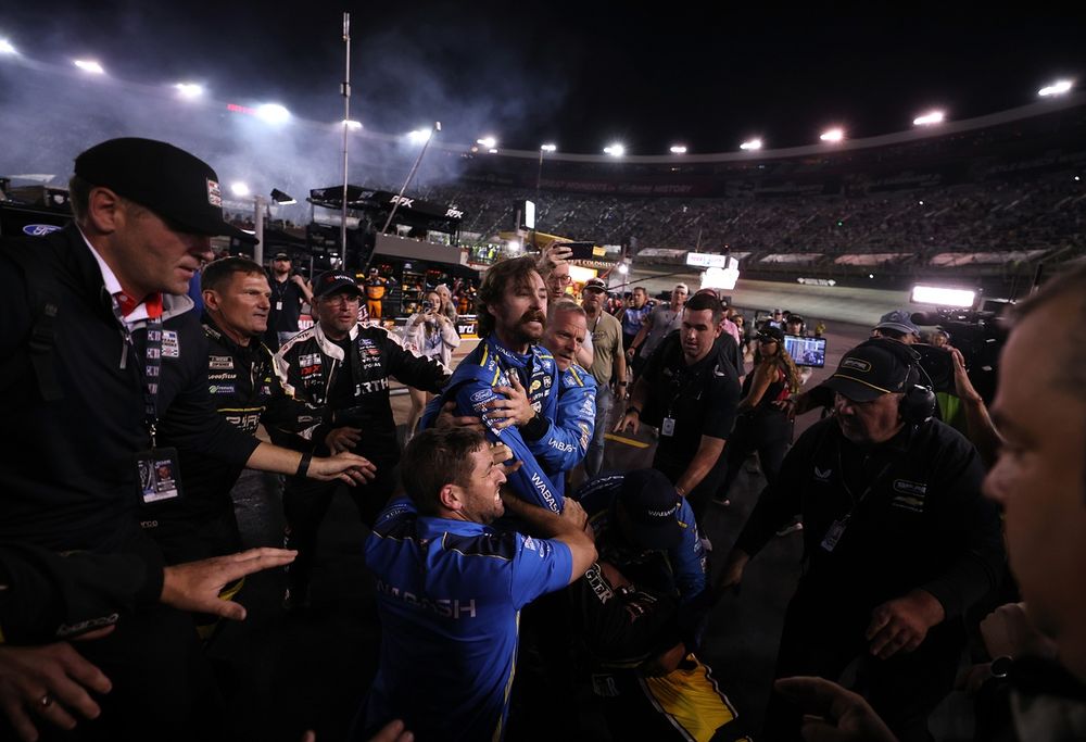 Carson Hocevar and Ryan Blaney fight