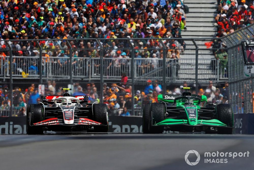 Nico Hulkenberg, Haas VF-24 battles with Zhou Guanyu, Stake F1 Team Kick Sauber C44 