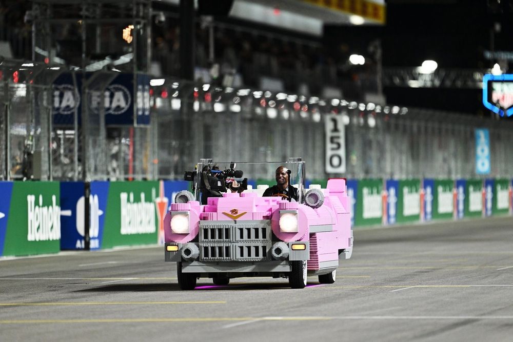 Terry Crews drives a Lego pink Cadillac to parc ferme 