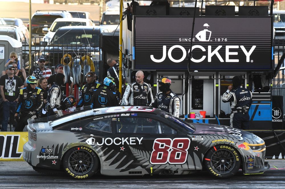 Shane van Gisbergen climbs out of car, Trackhouse Racing Chevrolet