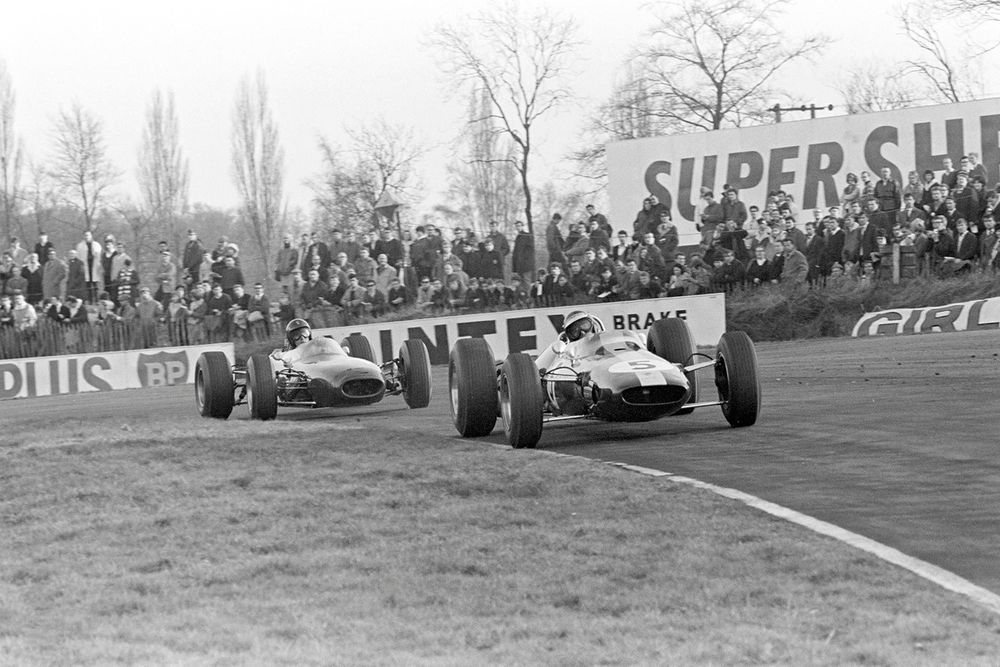Jim Clark, Lotus 33 Climax, leads Dan Gurney, Brabham BT11 Climax