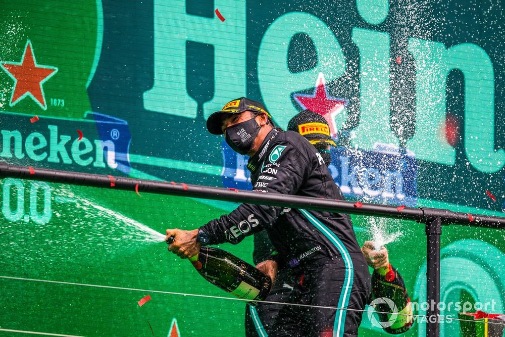 Lewis Hamilton, Mercedes-AMG F1, 1st position, and Valtteri Bottas, Mercedes-AMG F1, 2nd position, spray Champagne on the podium