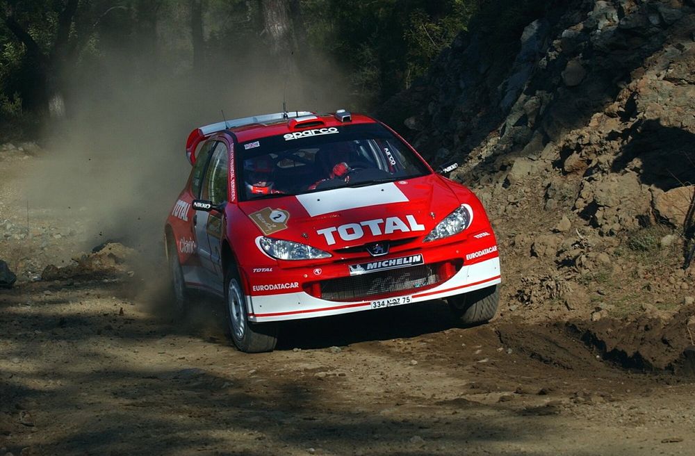 Richard Burns (GBR) with co-driver Robert Reid (GBR) Peugeot 206 WRC.  World Rally Championship, Rally of Turkey Shakedown, Kemer, Turkey, 26 February 2003.DIGITAL IMAGE