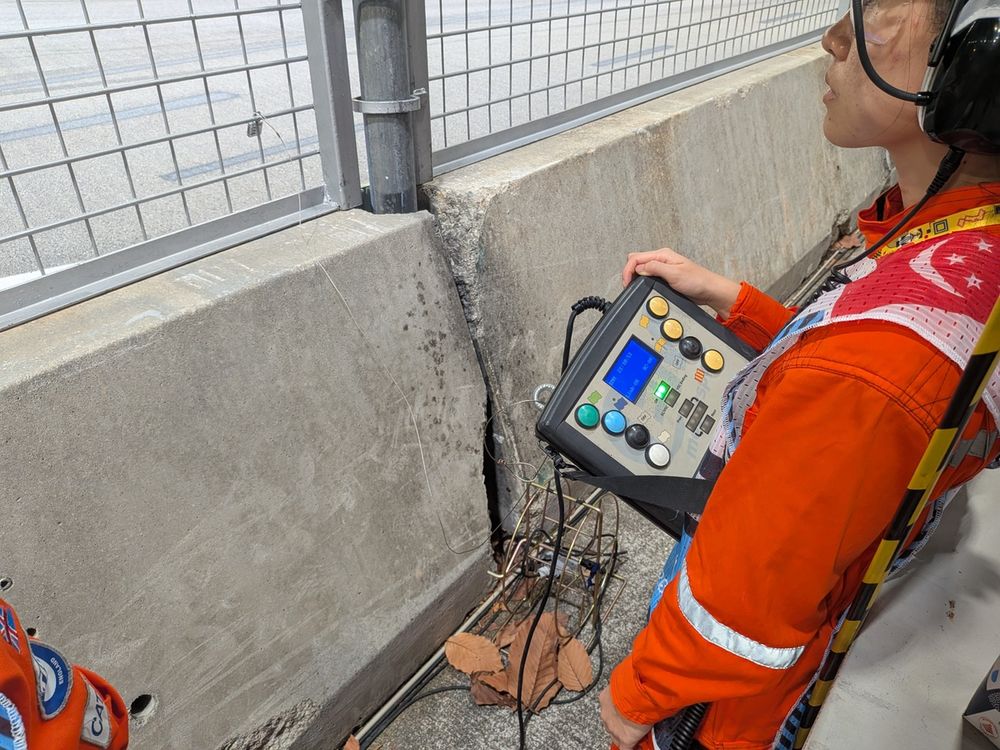 Malaysian marshal Pei operates the light panel
