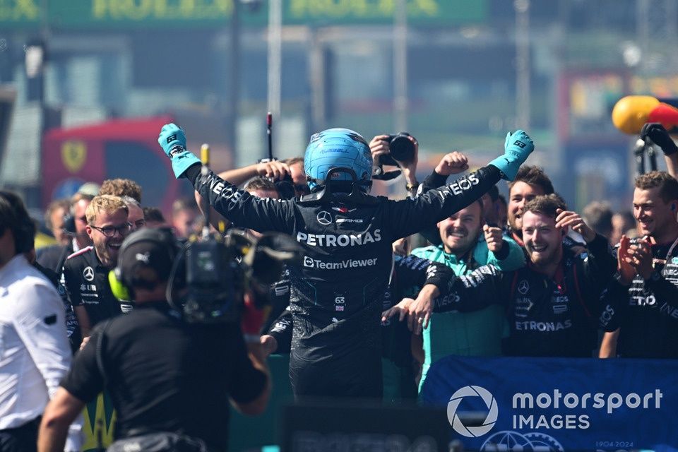 George Russell, Mercedes-AMG F1 Team, 1st position, celebrates with his team in Parc Ferme 