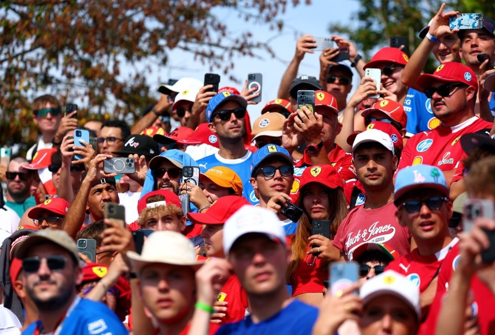 Fans look on during the pre-race ceremony.