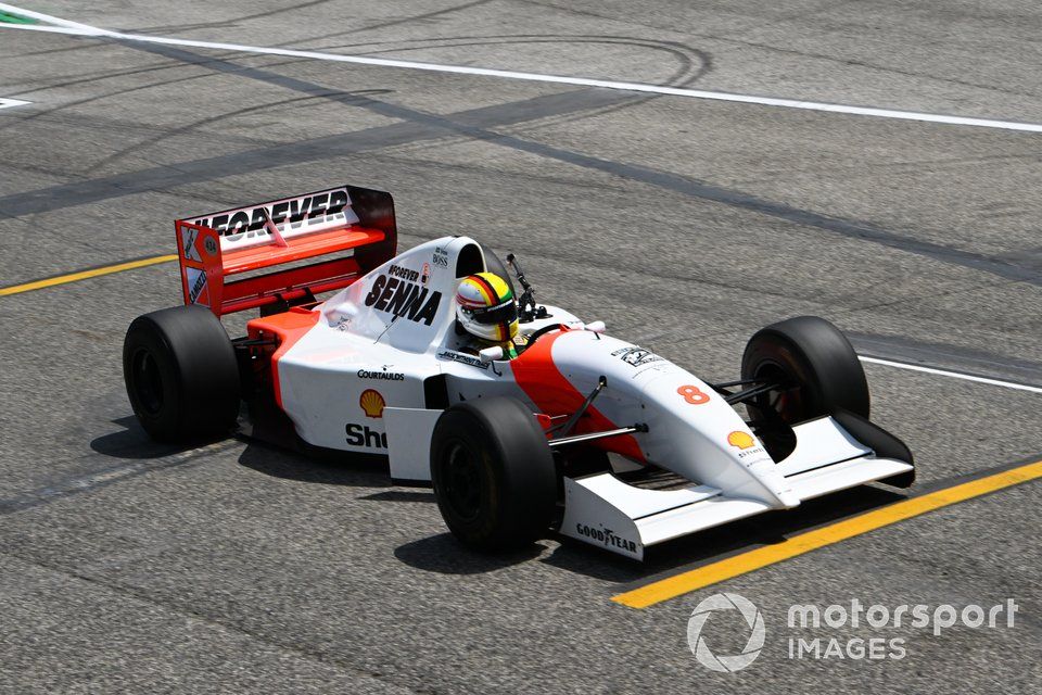 Sebastian Vettel drives Ayrton Senna's McLaren MP4/8