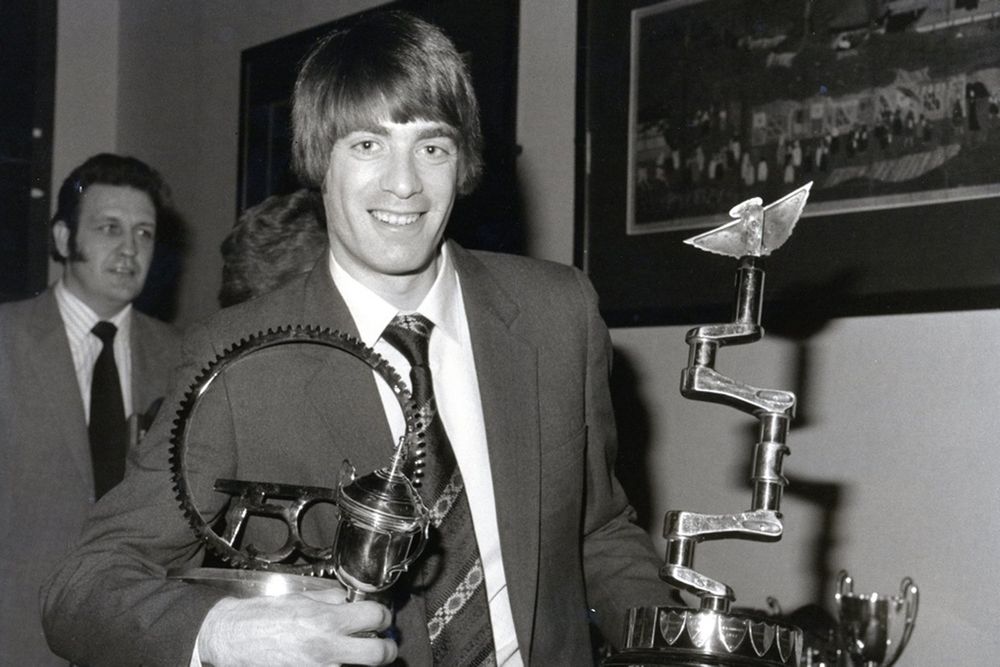 Harris “yonks ago” with 
750 Formula trophies; 
Harvey is in the background