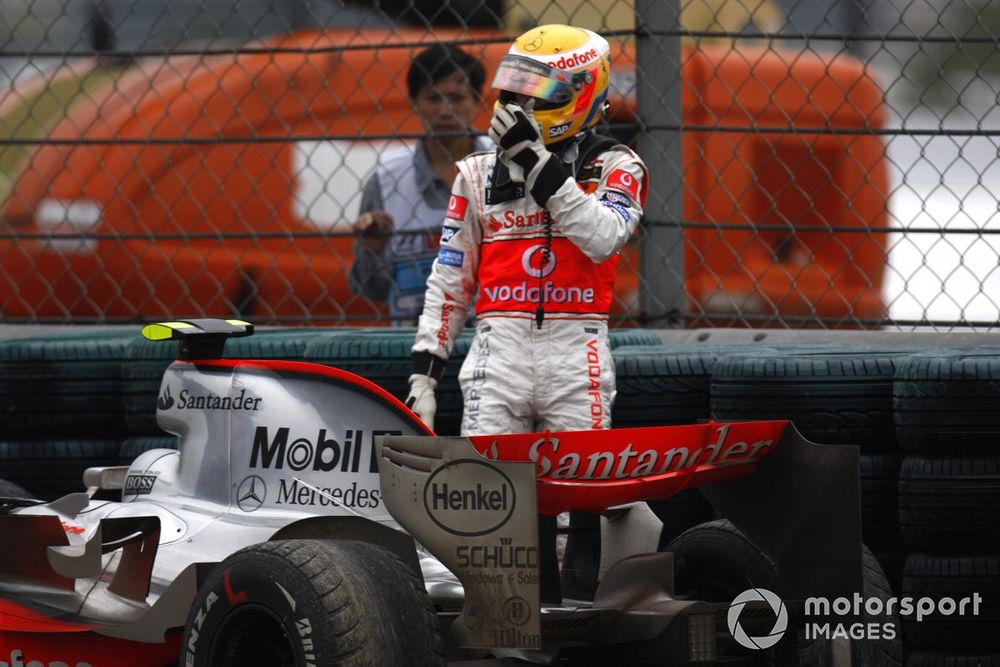 Lewis Hamilton, McLaren MP4-22 Mercedes, retired, abandons his car after ending his race in the gravel
