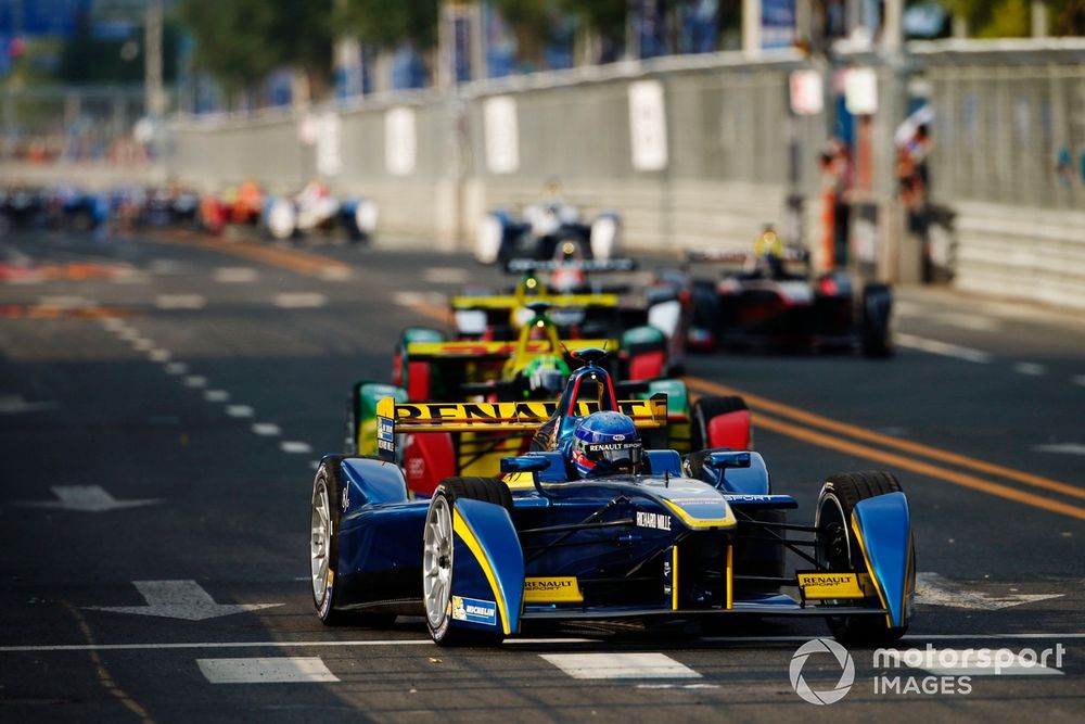 Prost led the inaugural race until final corner clash with Heidfeld opened the door for di Grassi