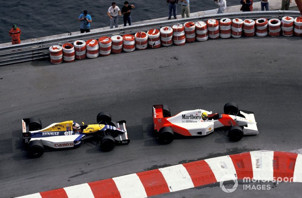 Mansell's unscheduled stop for a puncture in Monaco allowed Senna to sneak ahead and score a famous win