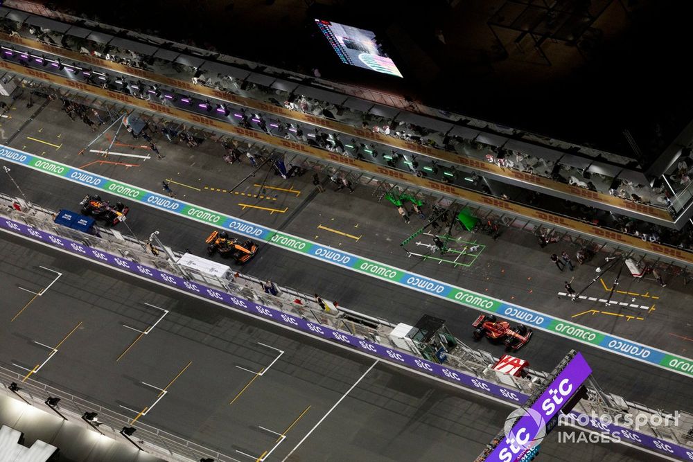 Carlos Sainz, Ferrari SF-24, Lando Norris, McLaren MCL38, Max Verstappen, Red Bull Racing RB20 in the pit lane 