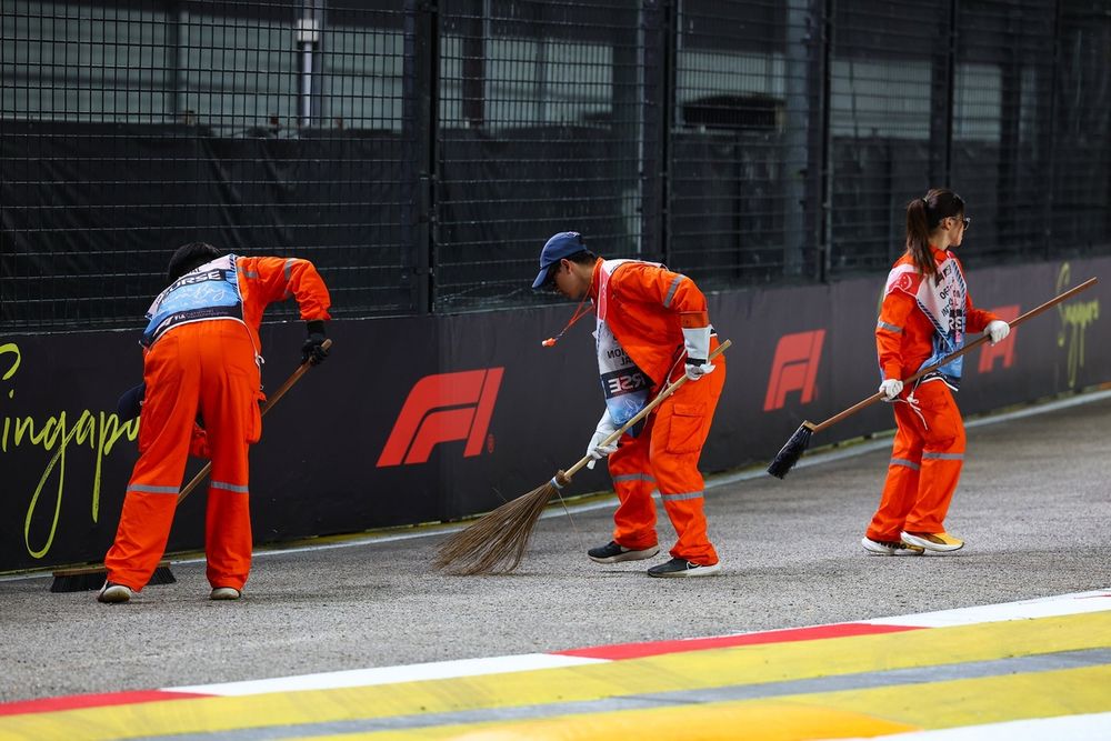 Marshals sweep debris after Liam Lawson's FP2 crash
