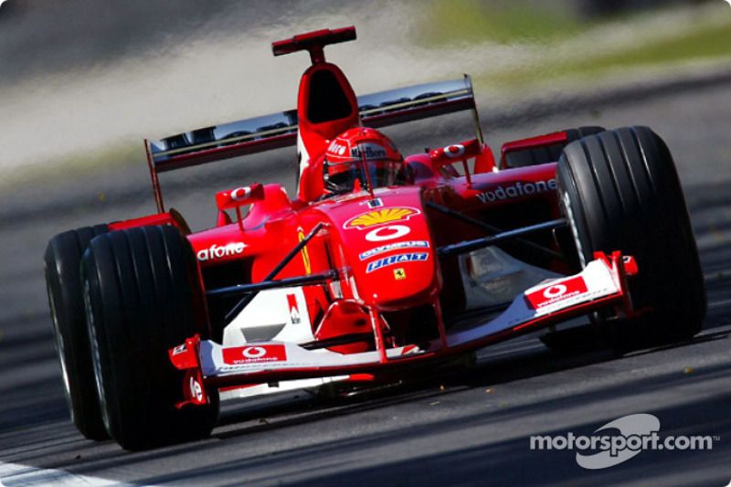 Michael Schumacher con la Ferrari F2003-GA vittoriosa a Monza
