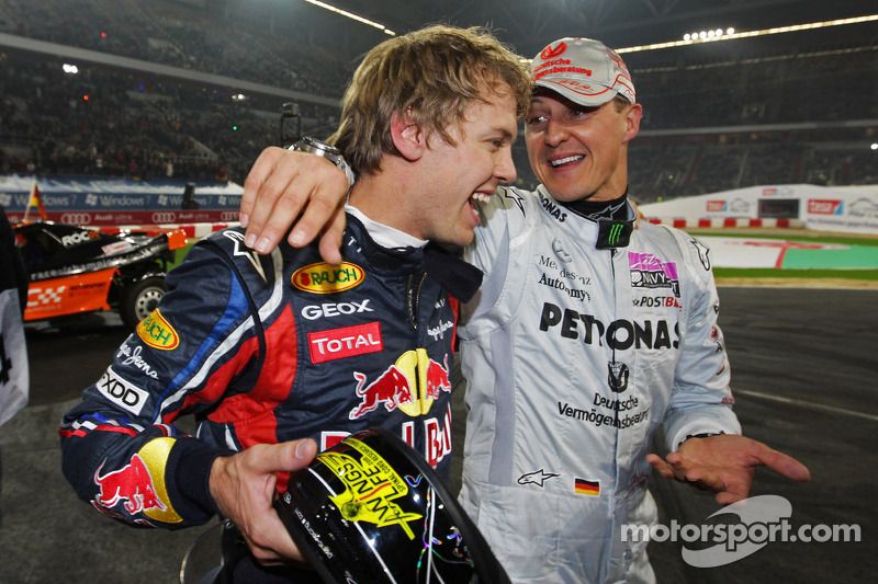Winners Sebastian Vettel and Michael Schumacher