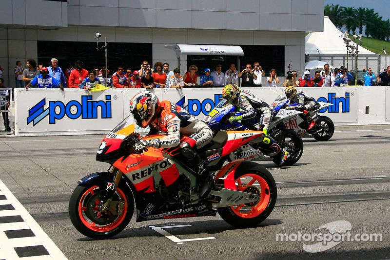 Dani Pedrosa, Valentino Rossi and Jorge Lorenzo on the front row
