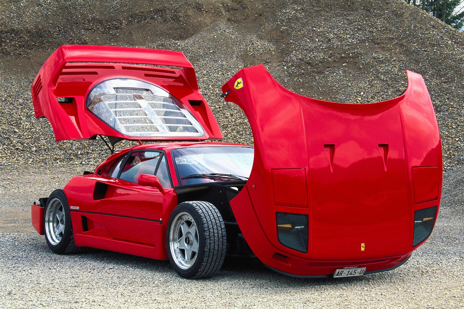 Spaceframe chassis meant the bodywork didn't have to be structural. This is a later model where wind-down windows made a concession to practicality