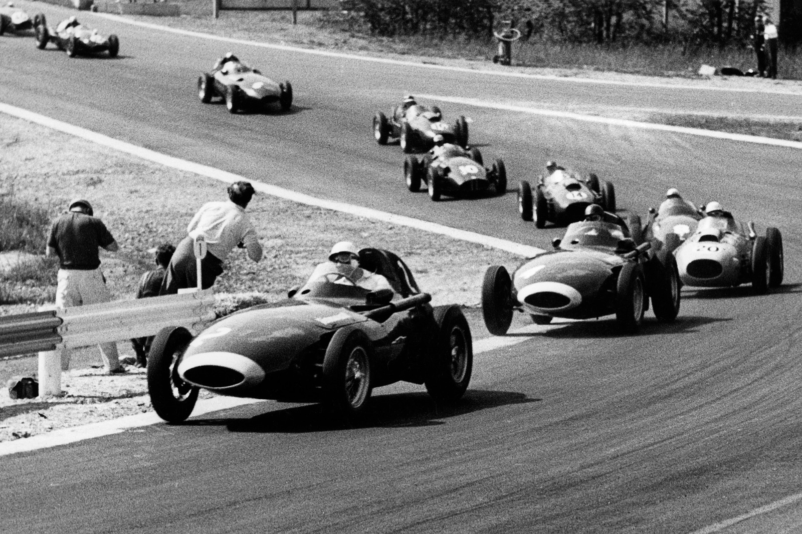 Stirling Moss leads the field through Eau Rouge at Spa in 1958, the year maximum race distance was cut to 300km from 500km