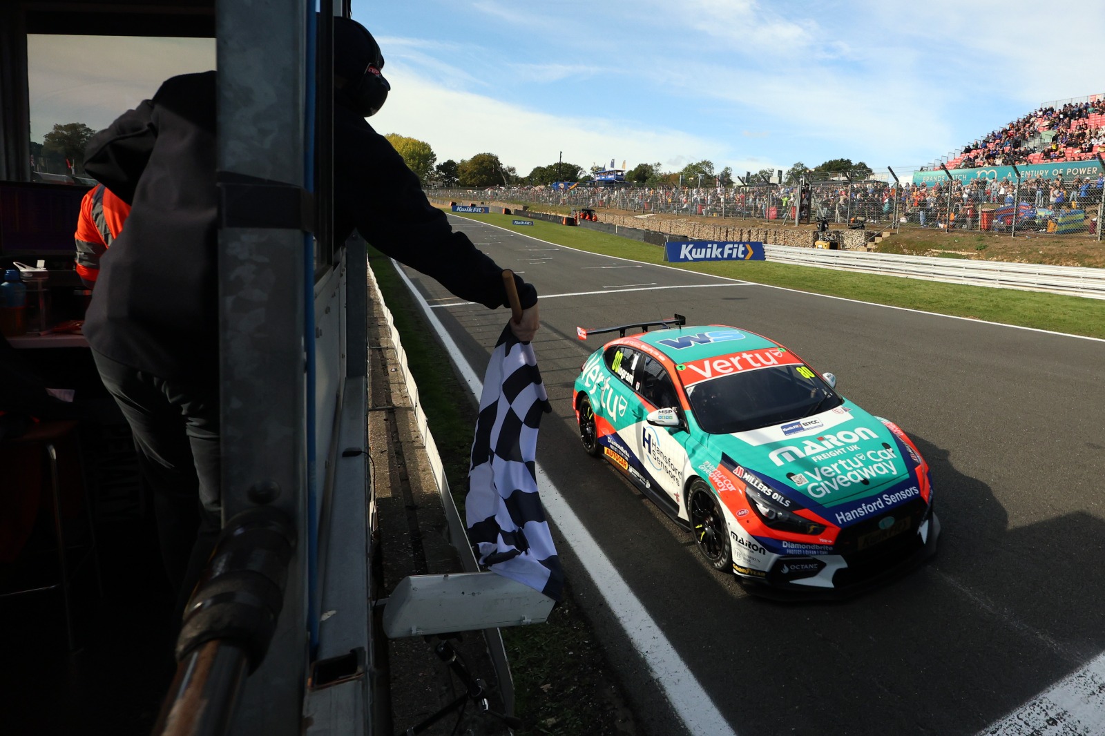 Tom Ingram takes the chequered flag in race one